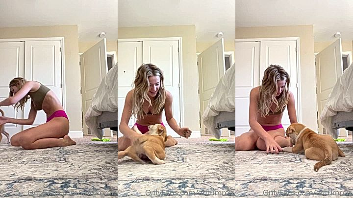 Autumren playing with her dog in her sexy lingerie