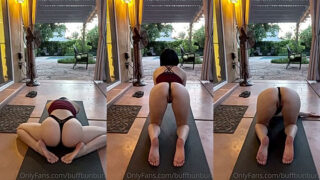 Womanwearingred doing exercise in a lingerie  with her ass up