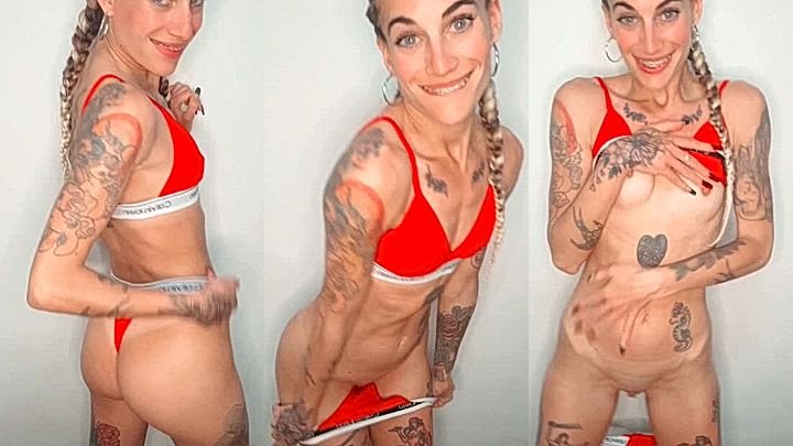 Kadito dancing and shaking her small ass while stripping her sexy lingerie