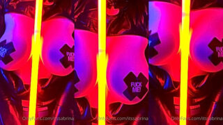 cosplayer Sabrina Lynn shaking her tits with a light saber in between