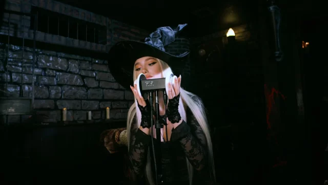 ASMR Ari Baby in  a custume talking over the michrophone