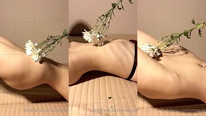Irena Ortega onlyfans teasing her body with a flower in leaked video