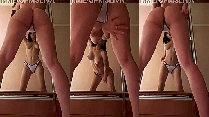 Irena Ortega onlyfans standing in front of a mirror withonly panties on and tits out