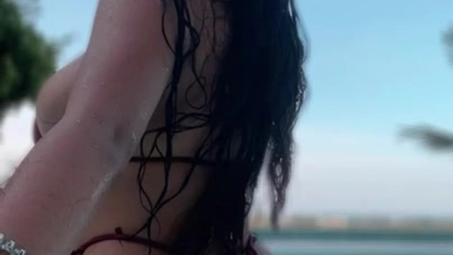 sexy onlyfans model shaking her ass in the pool wearing a lingerie