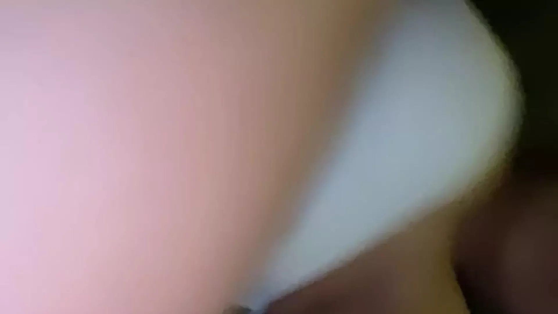 Alex Elena taking a selfie in a teasing video