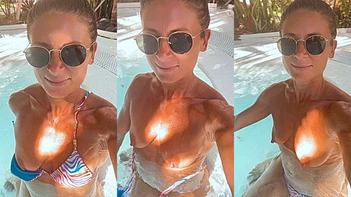 federicacorona taking a selfie in the pool with her tits out