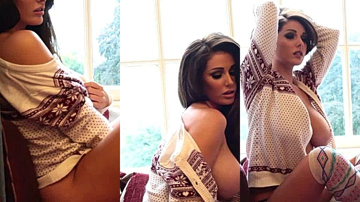 Lucy Pinder posing for photoshoot opens up her cloth and to show off her big tits