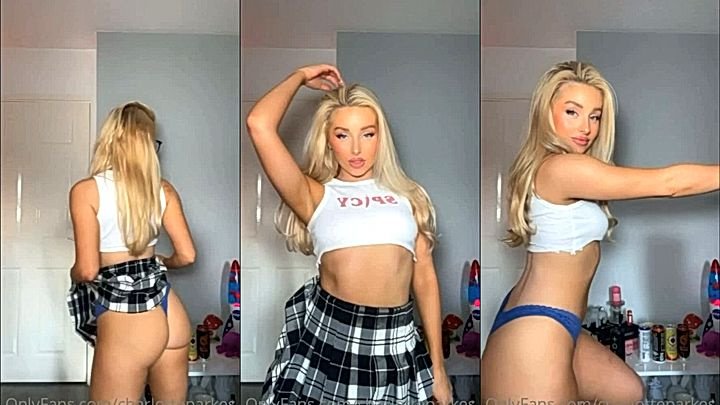 sexy Charlotte Parkes pulling up her skirt to show off her ass