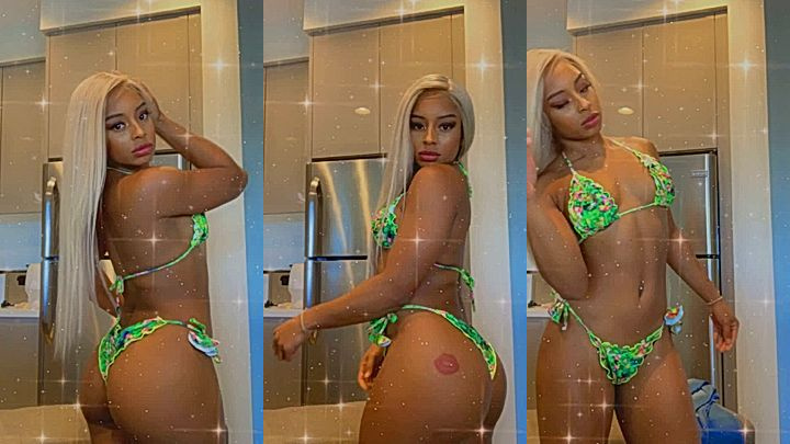 Qimmah Russo in front of the camera showing off her small ass