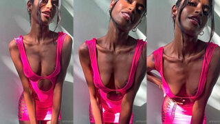 petite model Anna Celeste in a sexy pink dress teasing