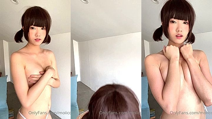 nude moiicos43 covering and squeezing her small tits with her hand