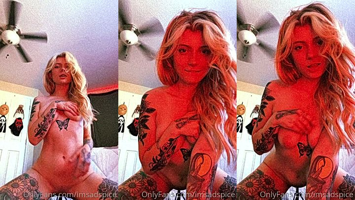naked Imsadspice taking a selfie covering her tits with her hand
