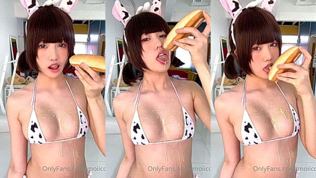 moiicos43 in a sexy lingerie eating bread and pouring creme on her body